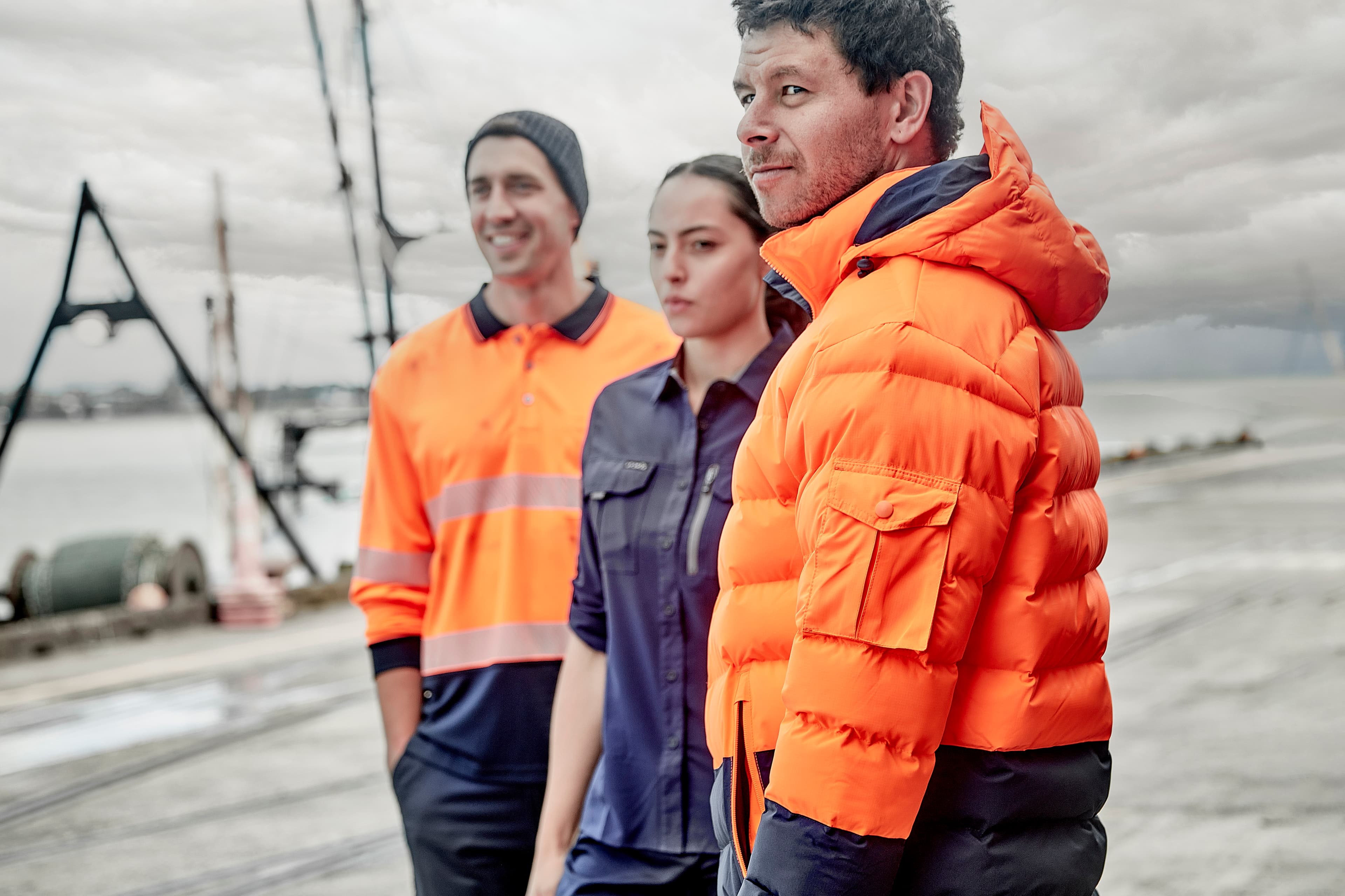 A team of Trade Workwear customers in branded uniforms