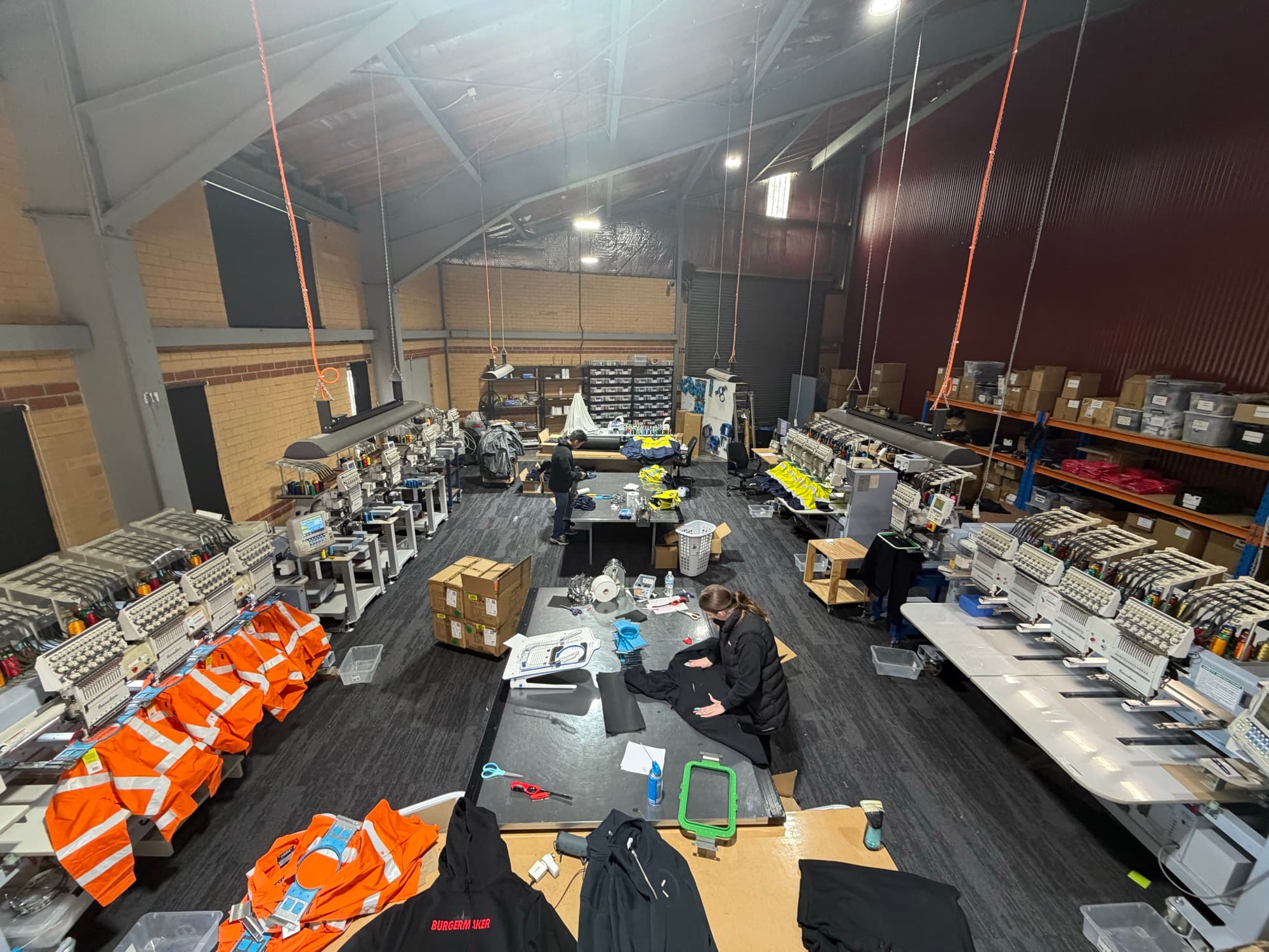 Embroidery machines and hi-vis garments in the Trade Workwear production facility in the ACT